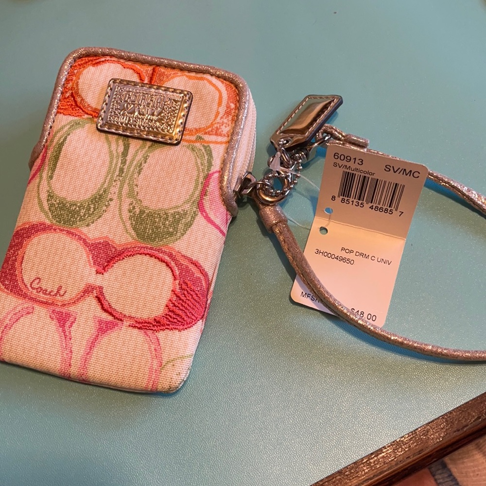 Coach camera, phone zippered wristlet.